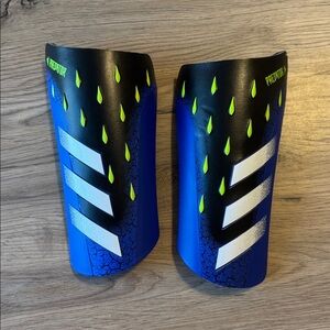 Adidas Predator Blue Shin Guards with White and Yellow Accents
